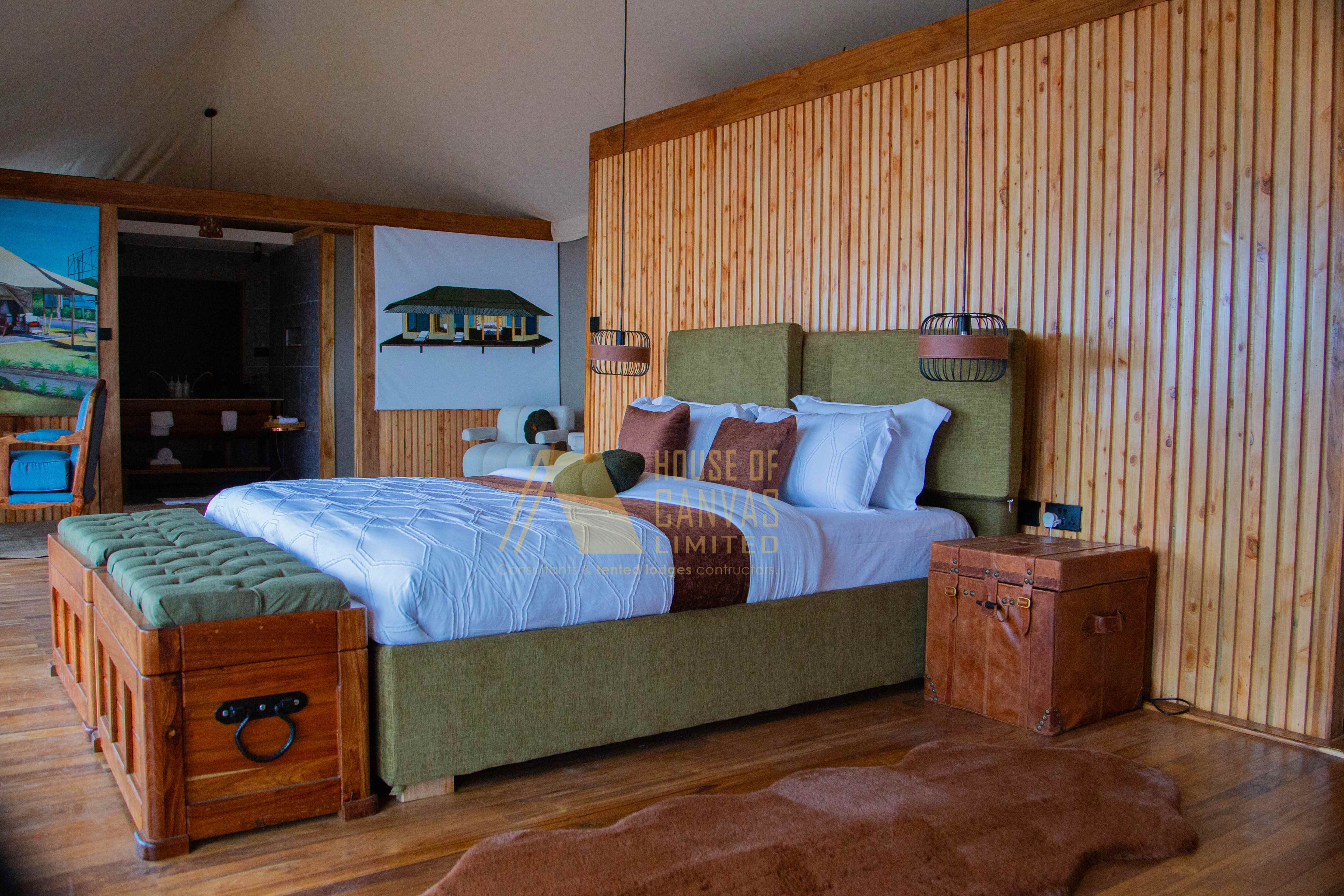 Luxury bedroom interior showcasing House of Canvas craftsmanship with wooden paneling and safari decor