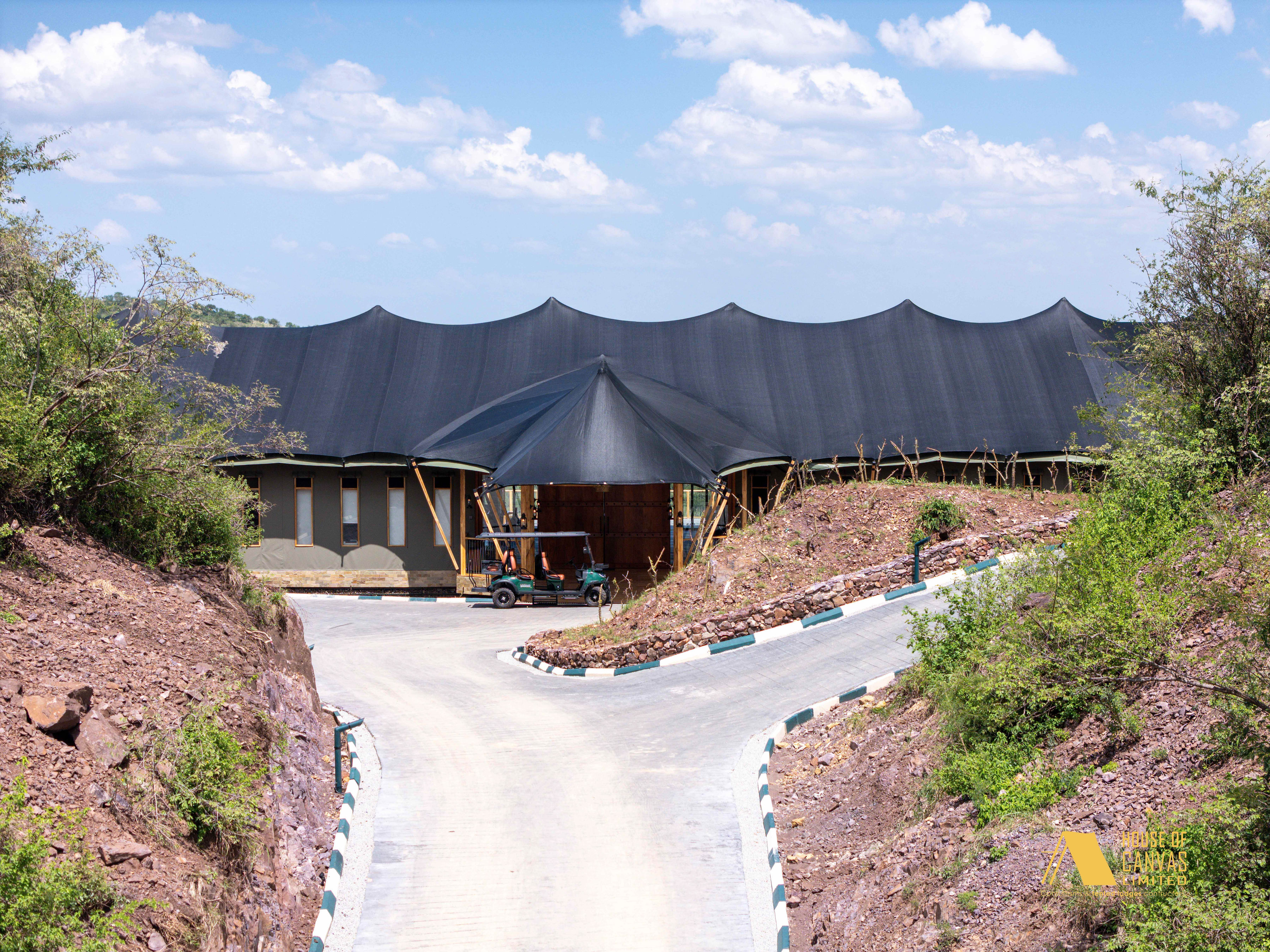Dawn aerial shot of camp with morning mist