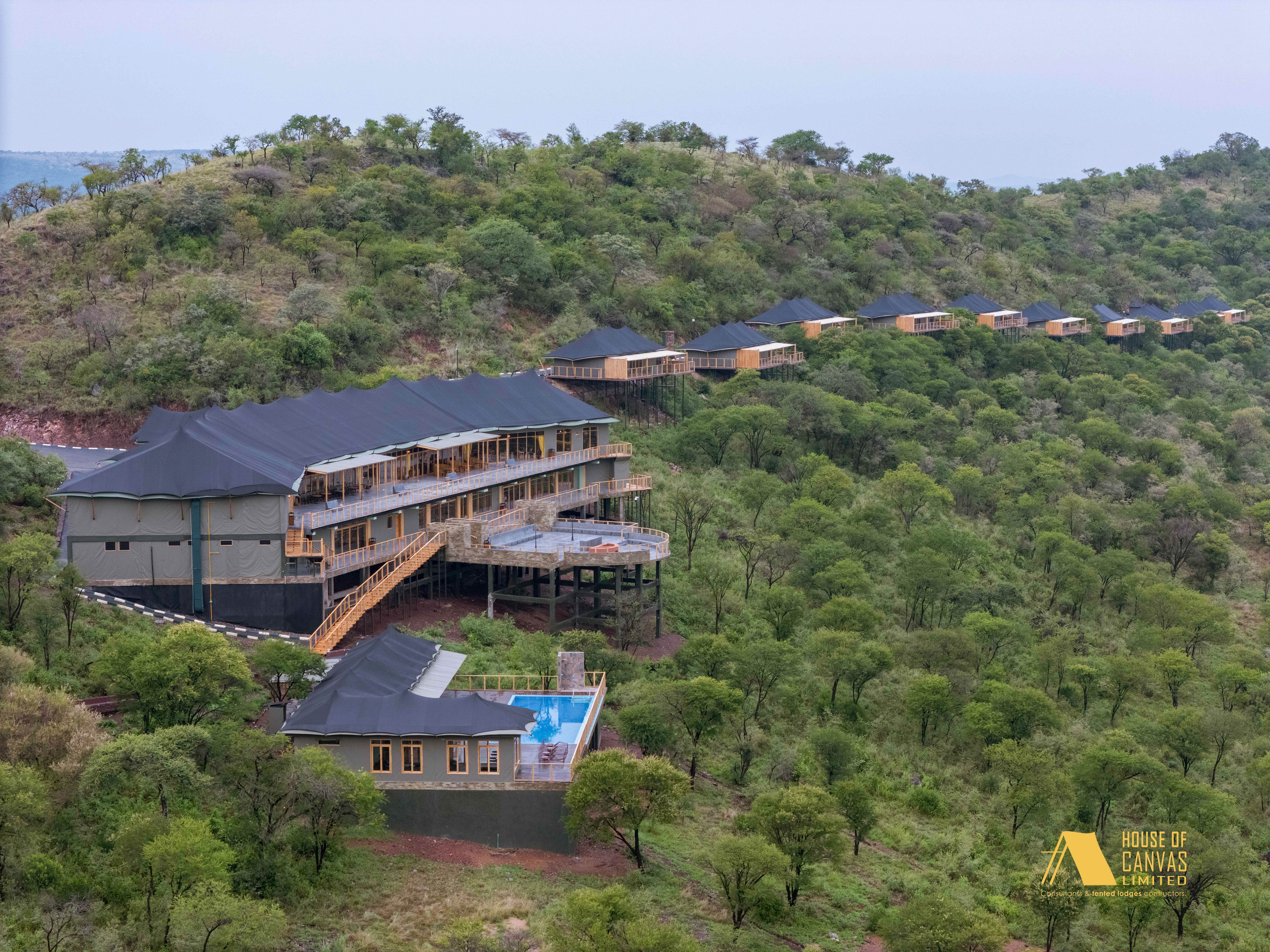 Aerial view of camp pathways and tent arrangements