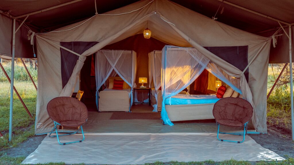 Spacious family tent with three beds and mosquito netting
