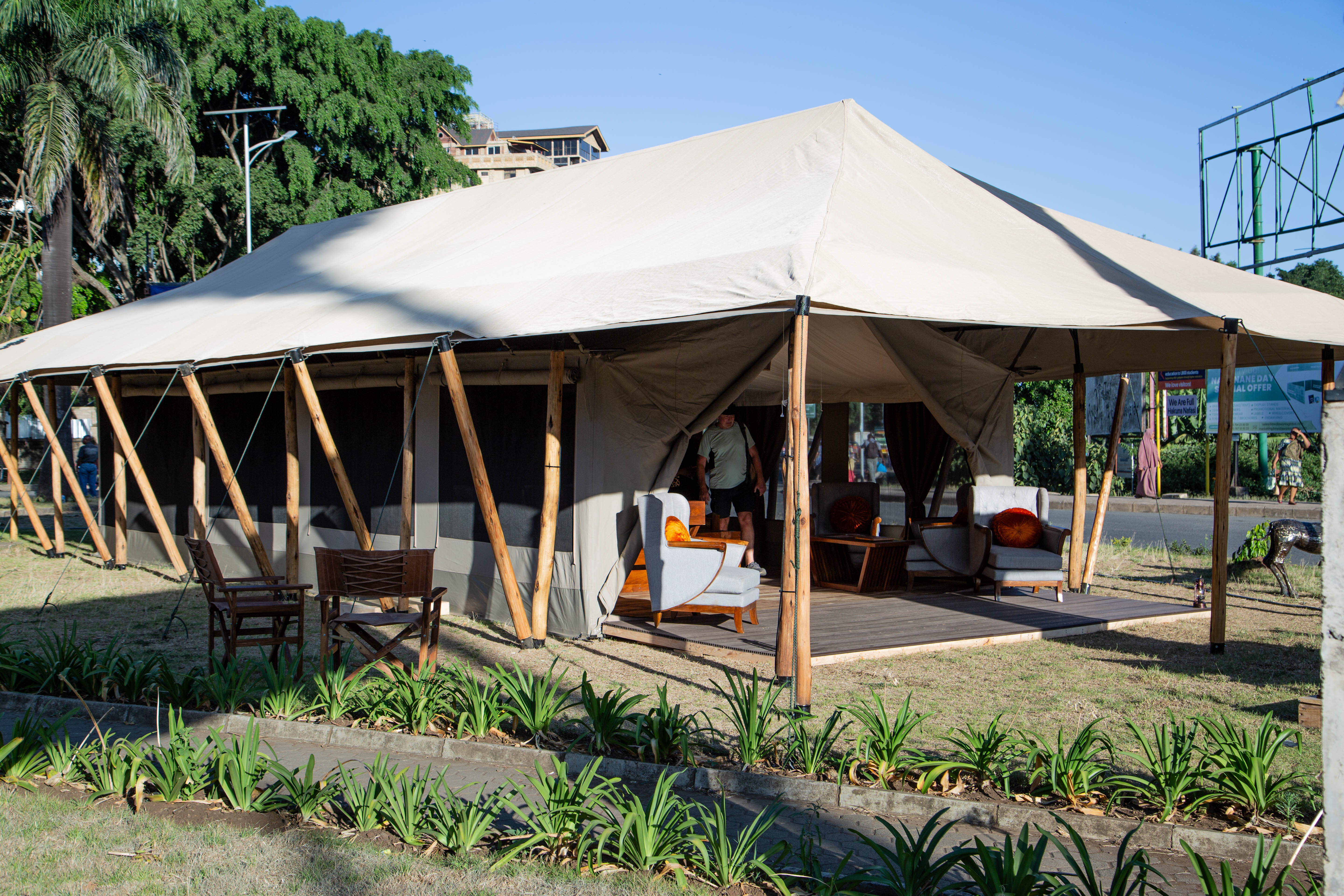 House of Canvas white canvas tent with wooden frame