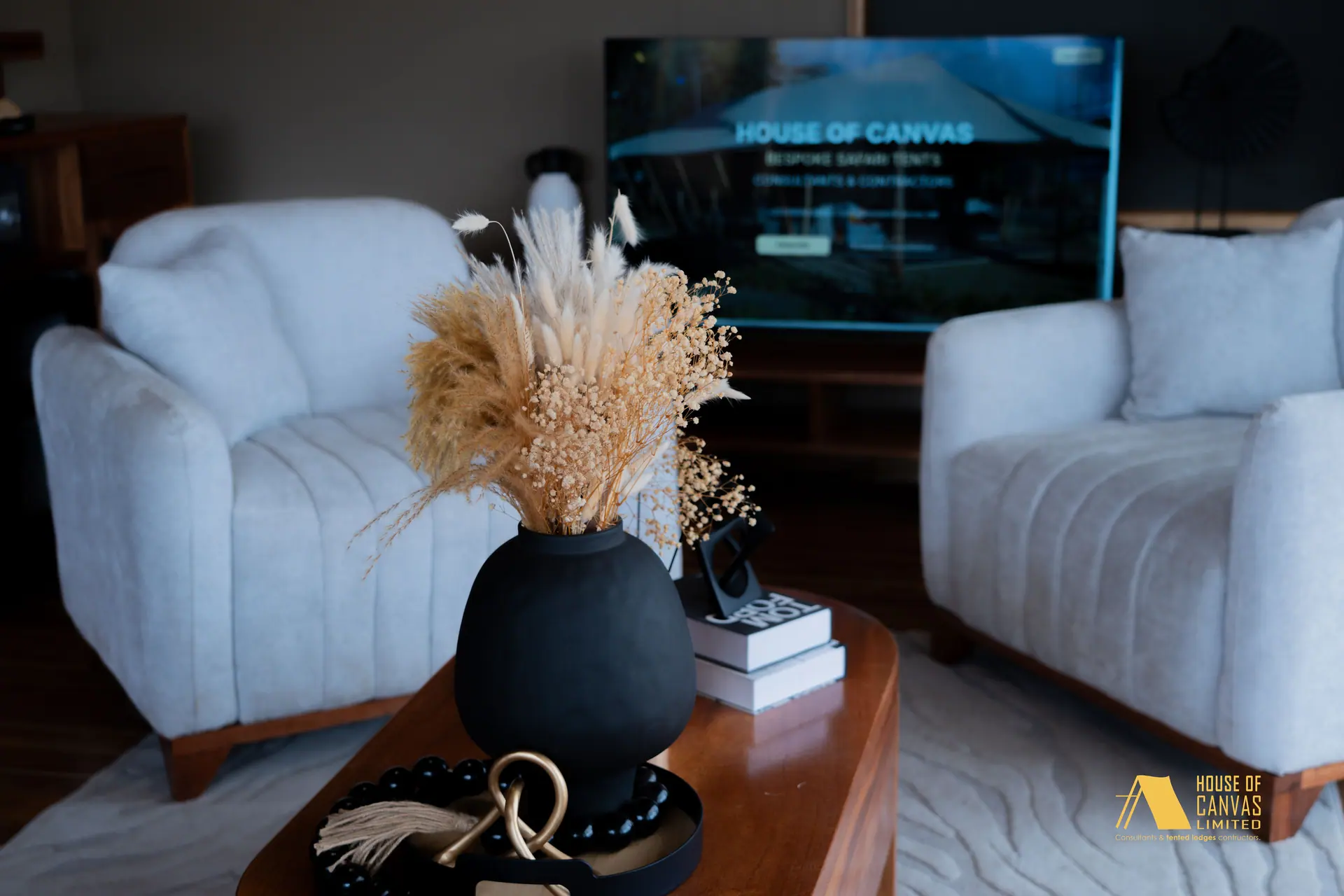Dried arrangement on a timber coffee table in the Kili Fair 2026 lounge