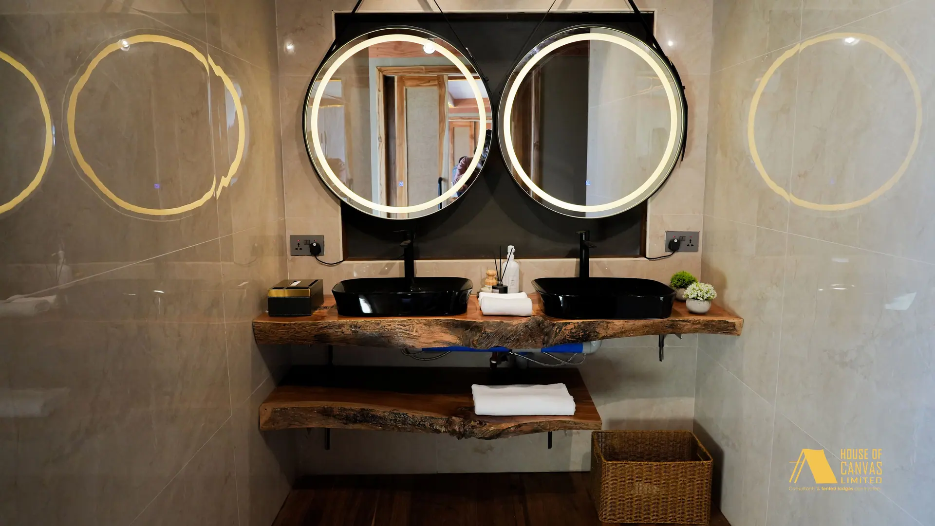 Backlit twin mirrors above a live-edge timber vanity at Kili Fair 2026